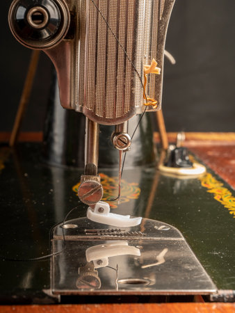 Soviet black sewing machine Machine needle close-up Sewing workshop conceptの写真素材