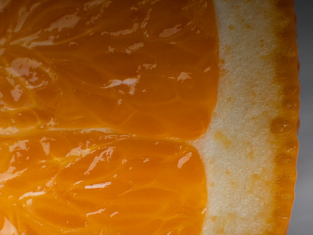 Macro photo of an orange slice in a cut. Concept of fresh juice and fruitの写真素材