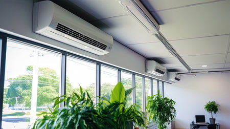 Air conditioners providing coolness in the office room.の素材