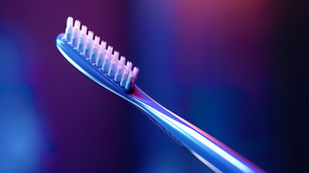 A close frame of the details of the handle and bristles of the toothbrush.の素材