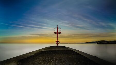 Sunset in the Asturias beach of candas during summerの写真素材