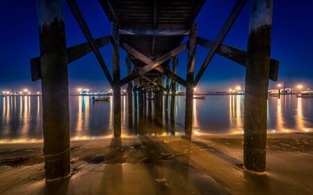 Night on the river of Aviles under a bridgeの写真素材