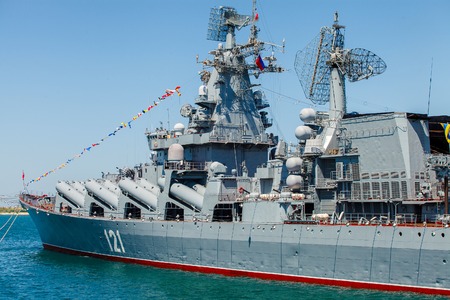 SEVASTOPOL CRIMEA MAY 9: Parade of the Russian warships celebrating in honor of 70th anniversary of Victory Day on May 9th 2015 Russian Navy flagship cruiser Moskva in the Sevastopol Bay Crimeaのeditorial素材