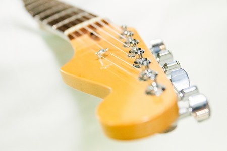 Image of guitar fingerboard on white background.の写真素材