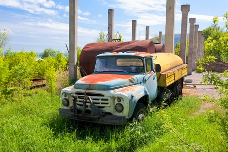 Abandoned truck ZIL, was used for irrigation of vineyards, old. Russiaの写真素材