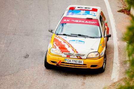 YALTA, UKRAINE - SEPTEMBER 14. Andrew Yaromenko drives his Citroen Saxo during the WOG Yalta Rally Fest 2013. 2 day. on September 14, 2013 in Yalta, Ukraine.のeditorial素材