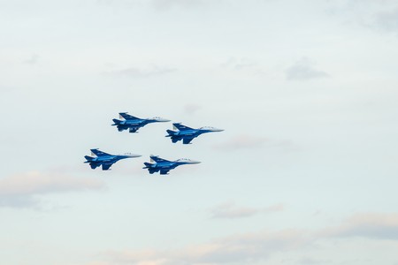 Yalta - June 12. Celebrating the Day of Russia of the flight group Russian Knights Russkie Vityazi on June 12, 2014 in Yalta, Russia. Group SU-27 in flight.のeditorial素材