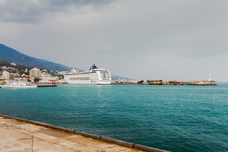YALTA, UKRAINE - APRIL 22. MSC Lirica cruise ship in the seaport city of Yalta on April 22, 2013 in Yalta, Crimea, Ukraine.のeditorial素材