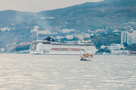 YALTA, UKRAINE - APRIL 22. MSC Lirica cruise ship in the seaport city of Yalta on April 22, 2013 in Yalta, Crimea, Ukraine. View of the ship from the sea.のeditorial素材