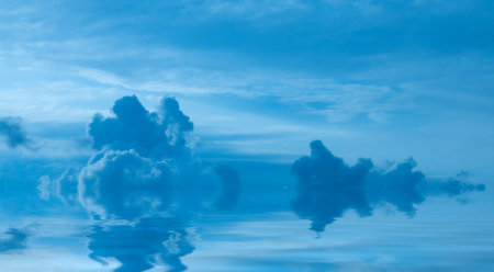 Cumulus and clouds over the water surface. Natural .の写真素材