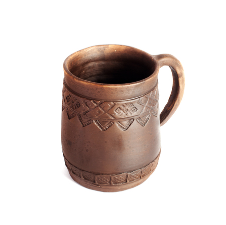 Old clay beer mug isolated on whiteの写真素材