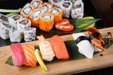 Japanes food. Assorted Sushi nigiri set on a wooden backgroundの写真素材