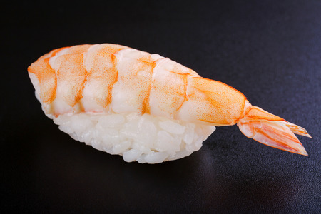 Nigiri sushi with shrimp on black backgroundの写真素材
