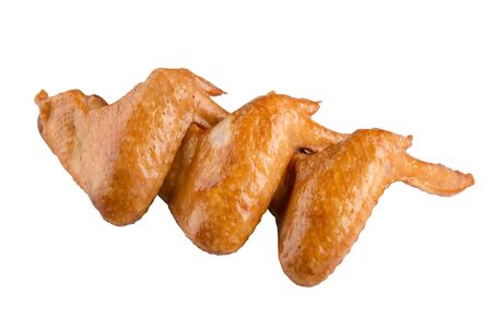Smoked chicken wings isolated on white background.の写真素材