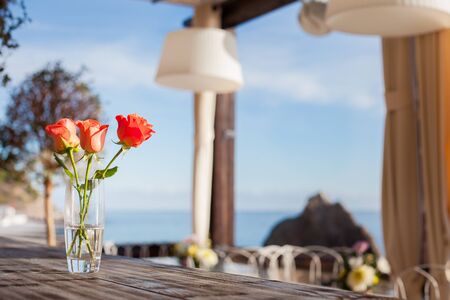 Outdoor summer terrace in a cafe by the sea.の写真素材