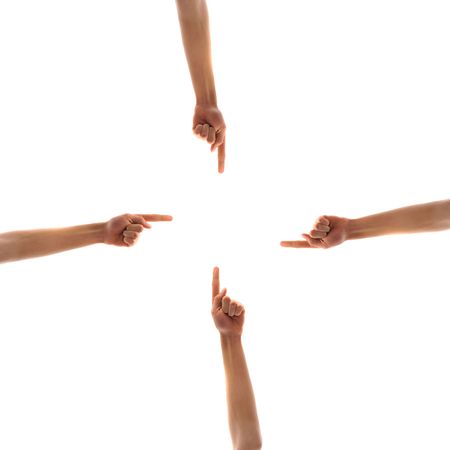 hands pointing towards centerの写真素材