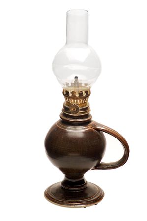 Brown oil lamp isolated on a white background.の写真素材