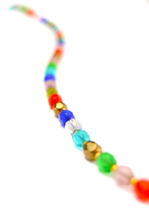 This is a colorful crystal necklace isolated on a white backgroundの写真素材