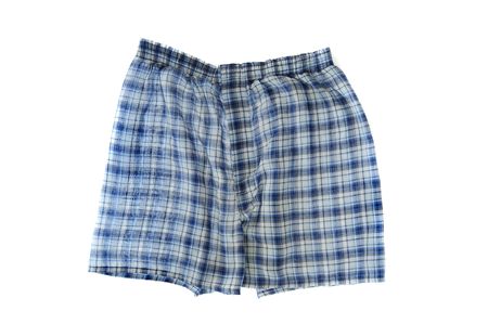 A pair of blue plaid boxer shorts isolated on white background. Wrinkled boxers.の写真素材