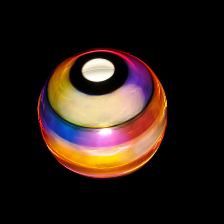 A colorful vibrant sphere isolated on a black background.