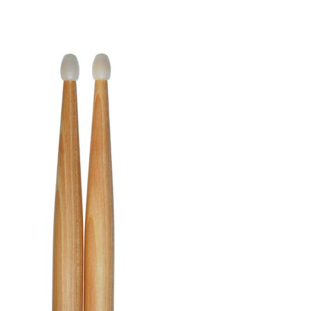 One pair of drum sticks isolated on white creates an abstract background in a square frame.の写真素材