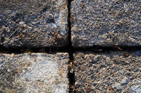 A Gray brick surface texture that is worn and oldの写真素材
