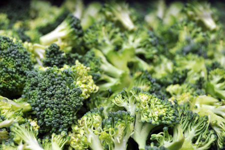 A macro closeup of the green vegetable, cut broccoli.