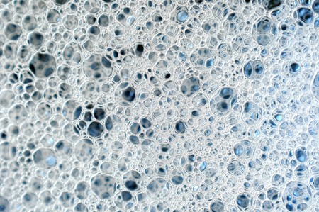 A closeup macro  texture of soap sud bubblesの写真素材