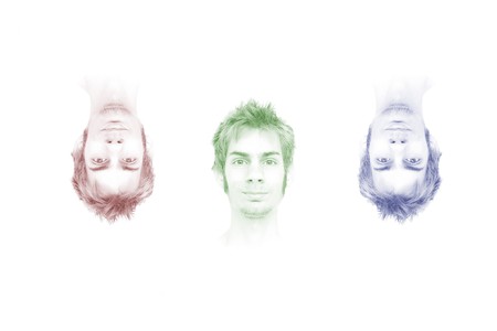 Abstract design of three heads with the RGB primary colors.の写真素材