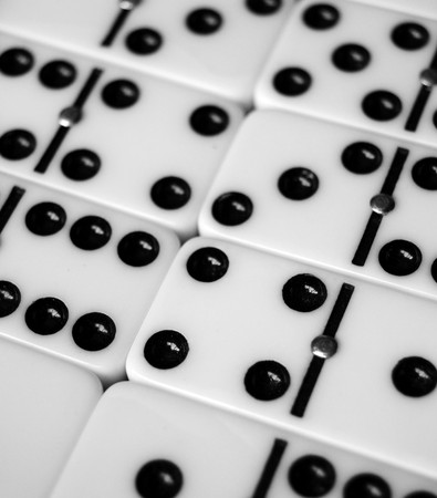 Closeup of a dominoes laying on a flat surface.の写真素材