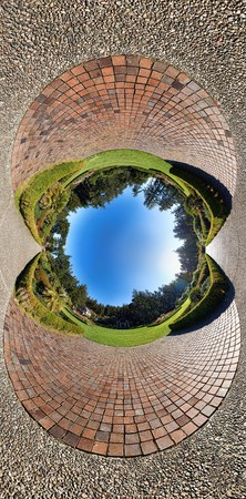 A garden with a brick walkway. の写真素材