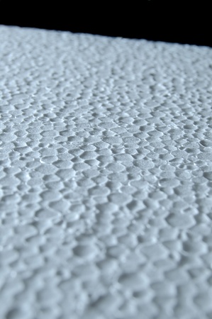 Macro closeup of a white texture that could also look like craters on the moon.の写真素材