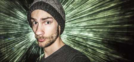 Single person dancing at rave concert with laser lightsの写真素材