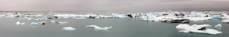 Cracking ice floating on lakeの写真素材
