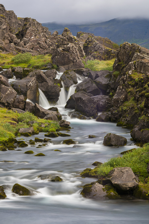 Waterfall Long Exposure iwth grass and rocksの写真素材
