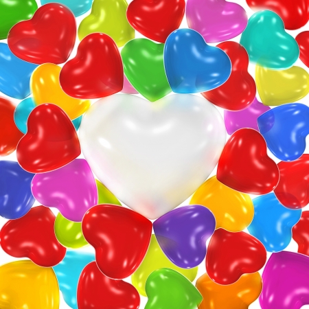 Multicolored heart-shaped balloons with white balloon in the centerの写真素材