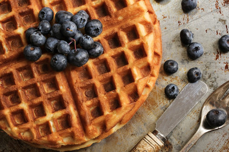 Warm Waffle Breakfast with blueberries  made in a home kitchen