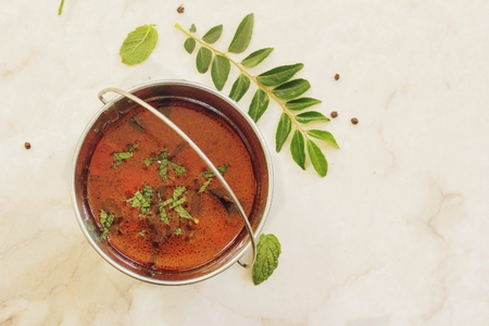 Rasam - South Indian soup using tamarind water tomatoes and lentil, selective focusの写真素材