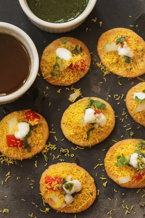 Dahi Batata Puri / Indian Chaat- Popular Maharashtrian street food, selective focus