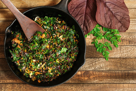Moringa red Spinach stir fry/ Cheera Drumstick leaves Thoran, selective focus