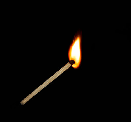 Light a match on a black background