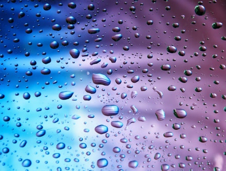 Many little water drops on the glass