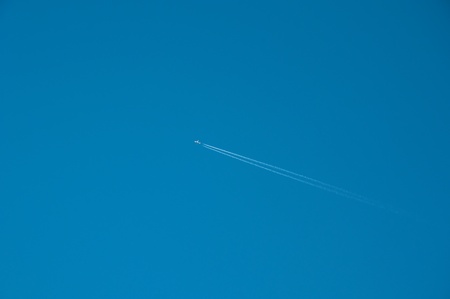 Large Passenger plane in the pure blue skyの写真素材