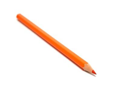 Orange sharp pencil on a white backgroundの写真素材