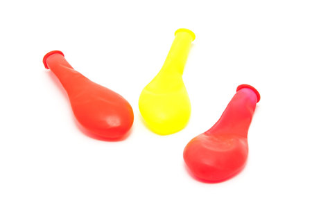 Three little balloons on a white background