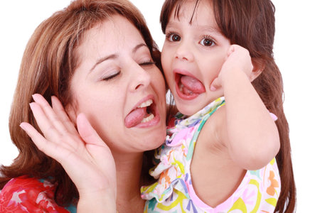Mother and daughter having funの写真素材