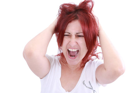 Screaming womanl on white backgroundの写真素材