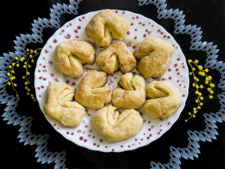 Homemade cookies on a dish on a decorative backgroundの写真素材