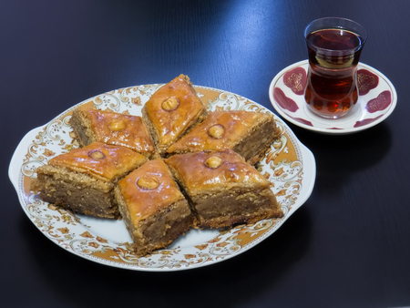 Baku baklava with tea poured into a glass of form Armudの写真素材