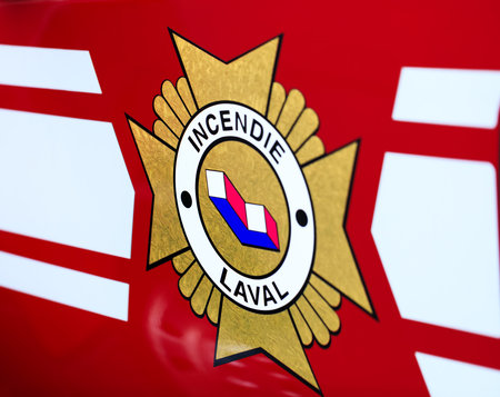 Laval, Canada: October 13, 2018: French inscription on the fire truck â€“ Incendie Laval. The...